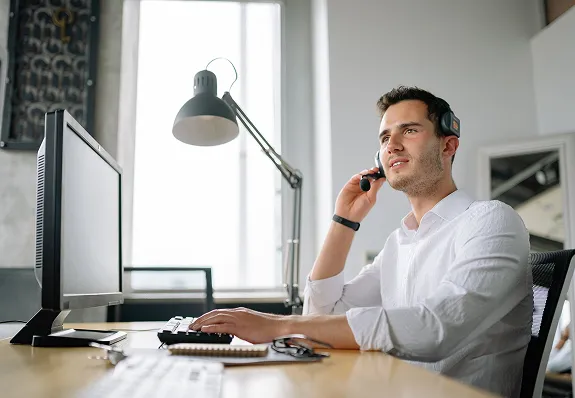 A man working in a call center
