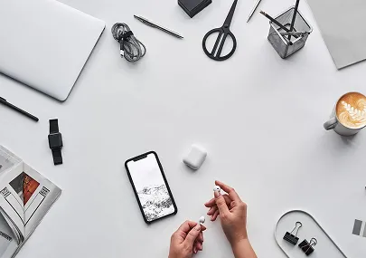 Person holding earphones